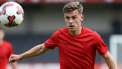 Barry Town edged Flint Town 3-2 on the North Wales Coast, with debutant Owen Brain scoring the winner